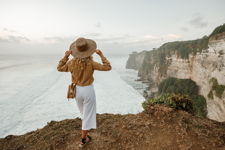 Woman enjoying a peaceful moment by the water