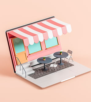 Open Laptop with a cafe patio on the keyboard. 