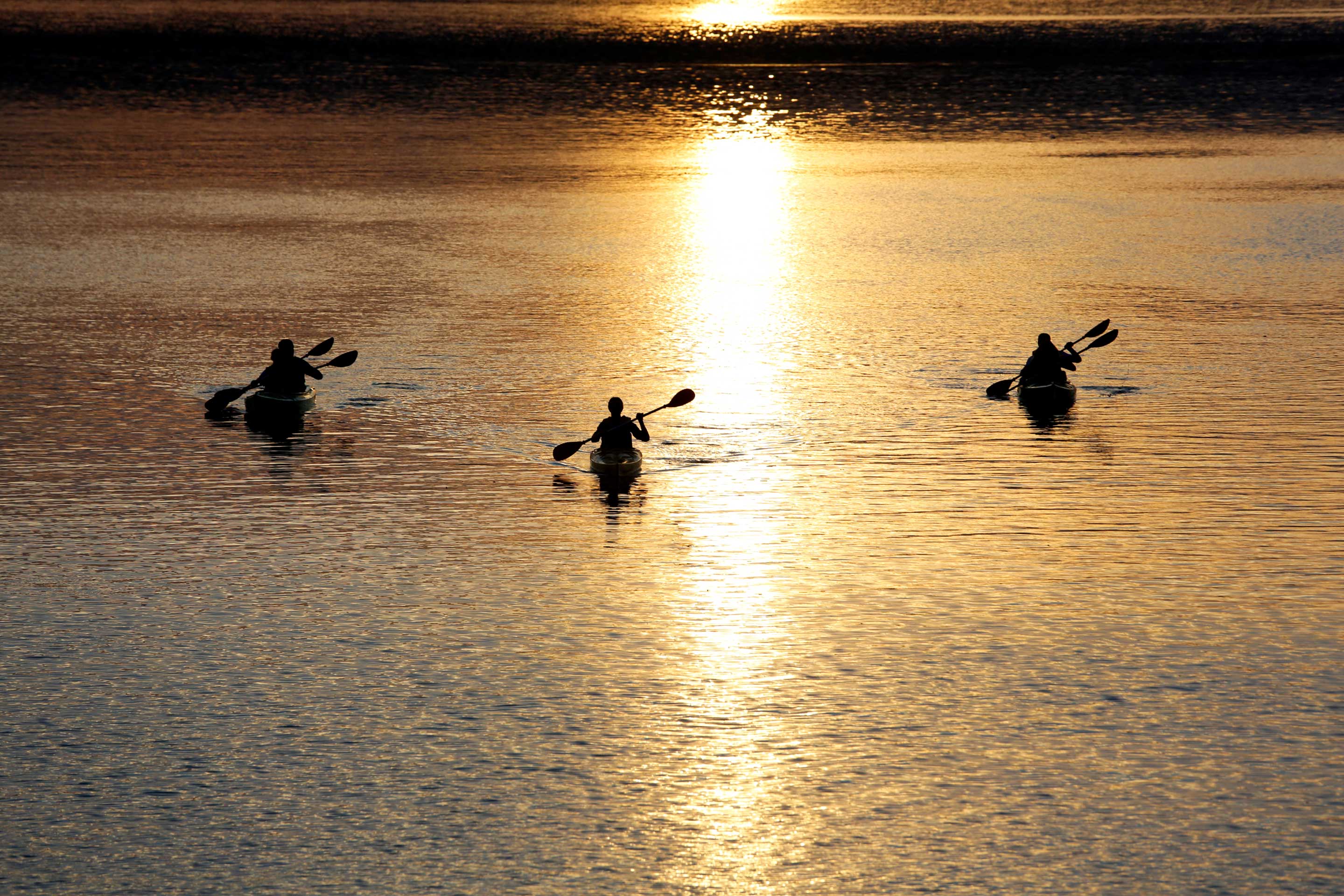 Kayakers at Sunset