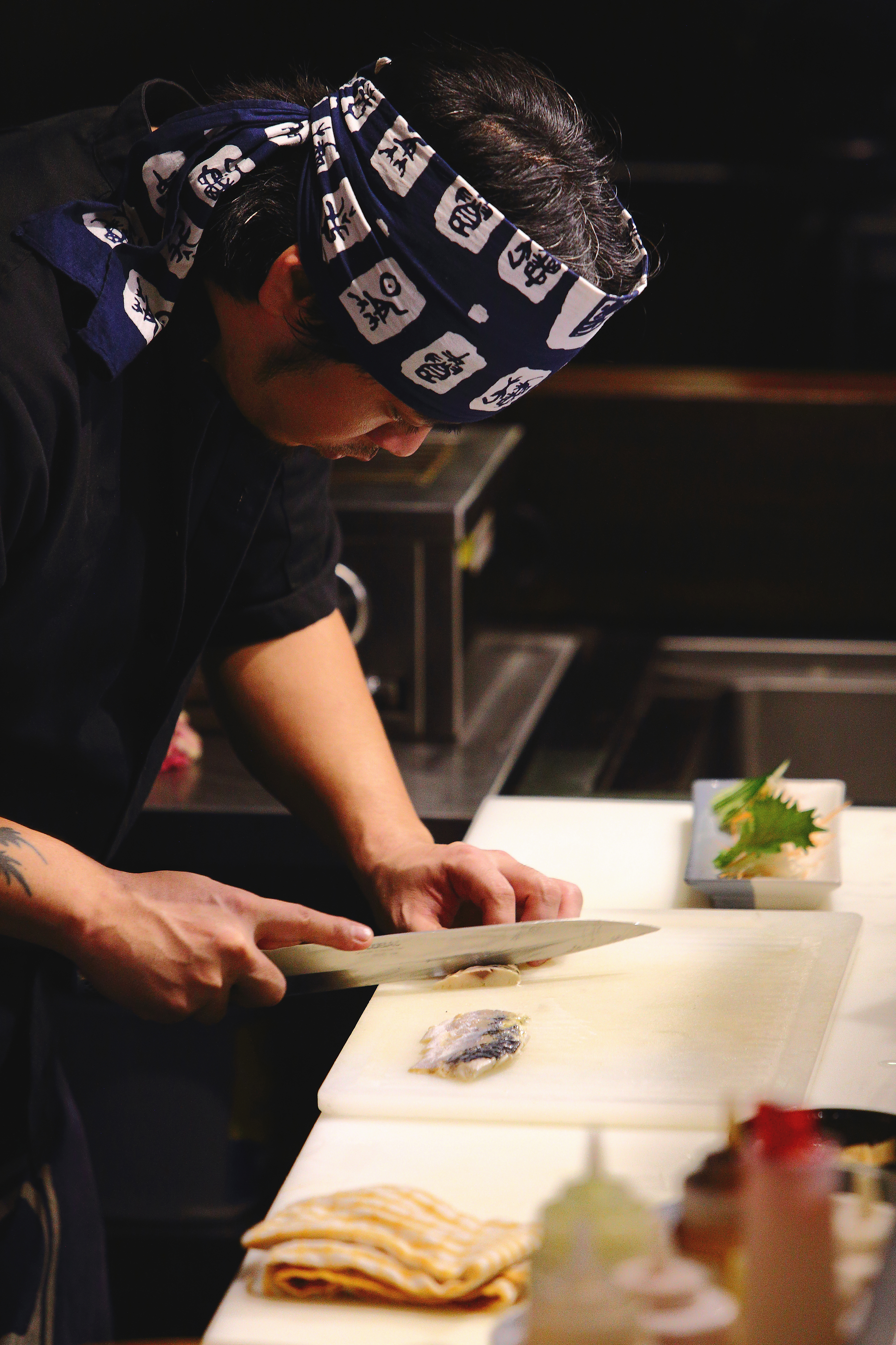 Chef Slicing Fish