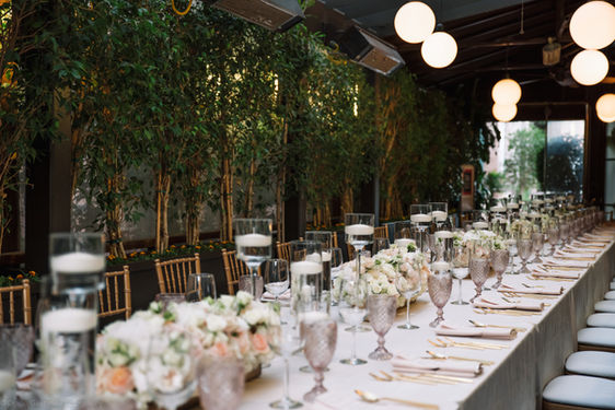 Imperial reception table with flowers and all prepared for the wedding reception.