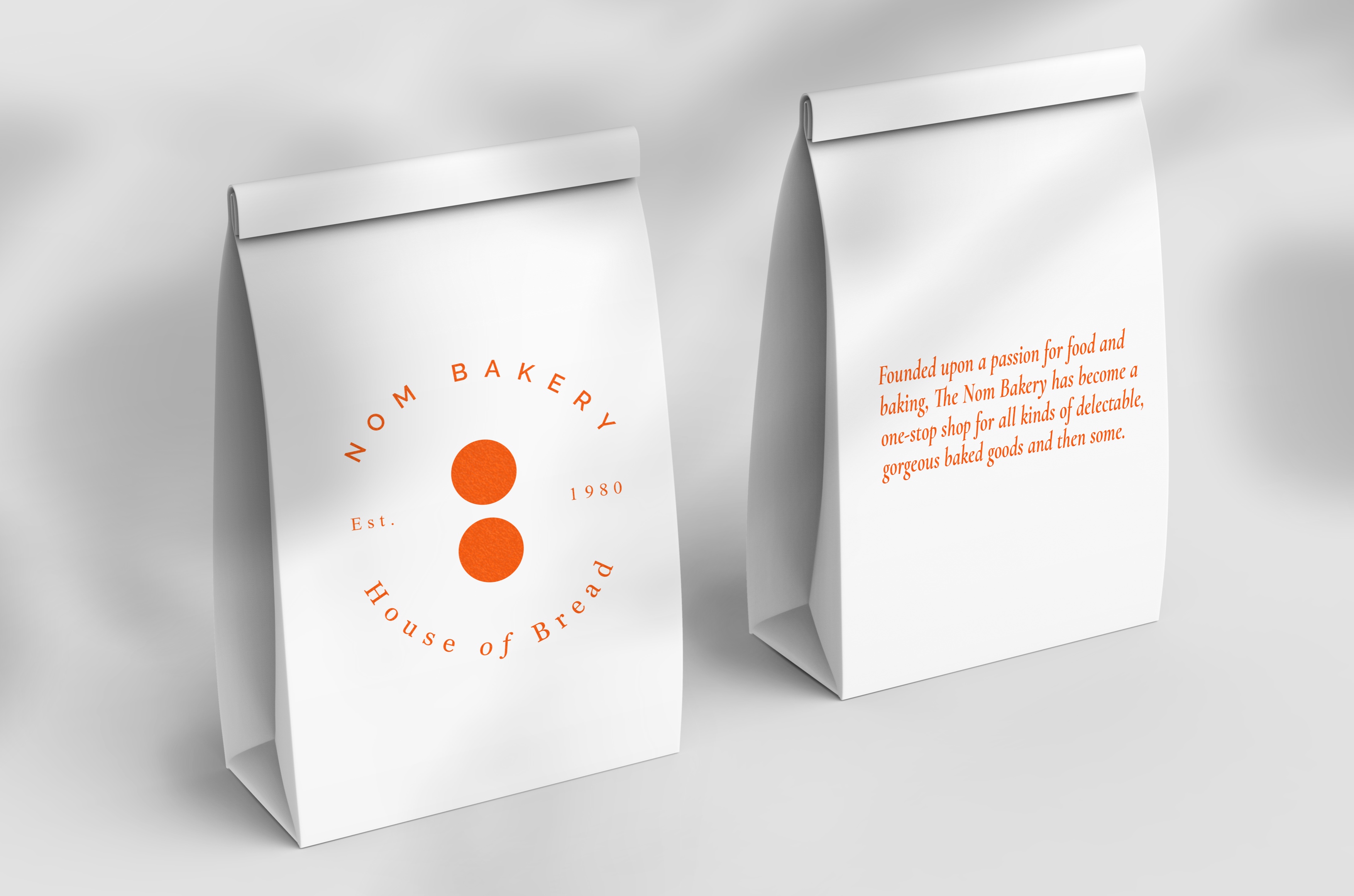 NOM Bakery's Brand identity on paper bags