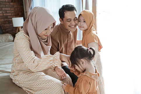 A mother, father and their two children