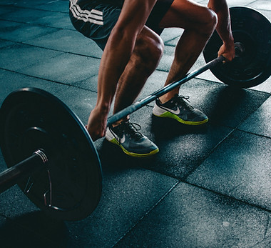 Person Lifting Barbell