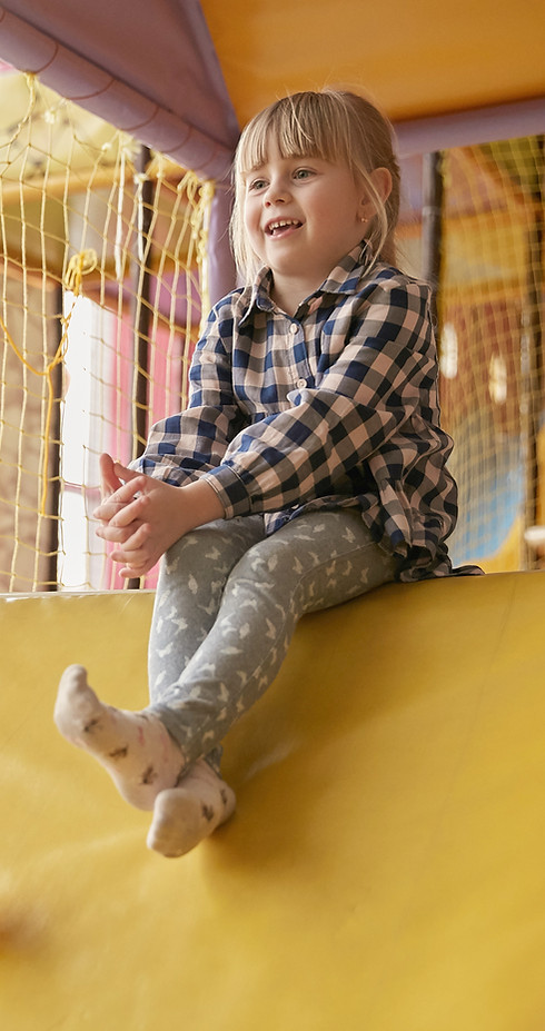 Child Sliding Playfully