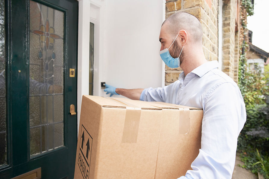 Delivery man ring doorbell at house