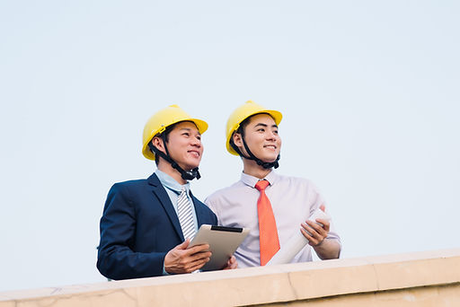 Managers Supervising Construction Site