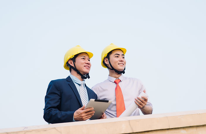 Managers Supervising Construction Site