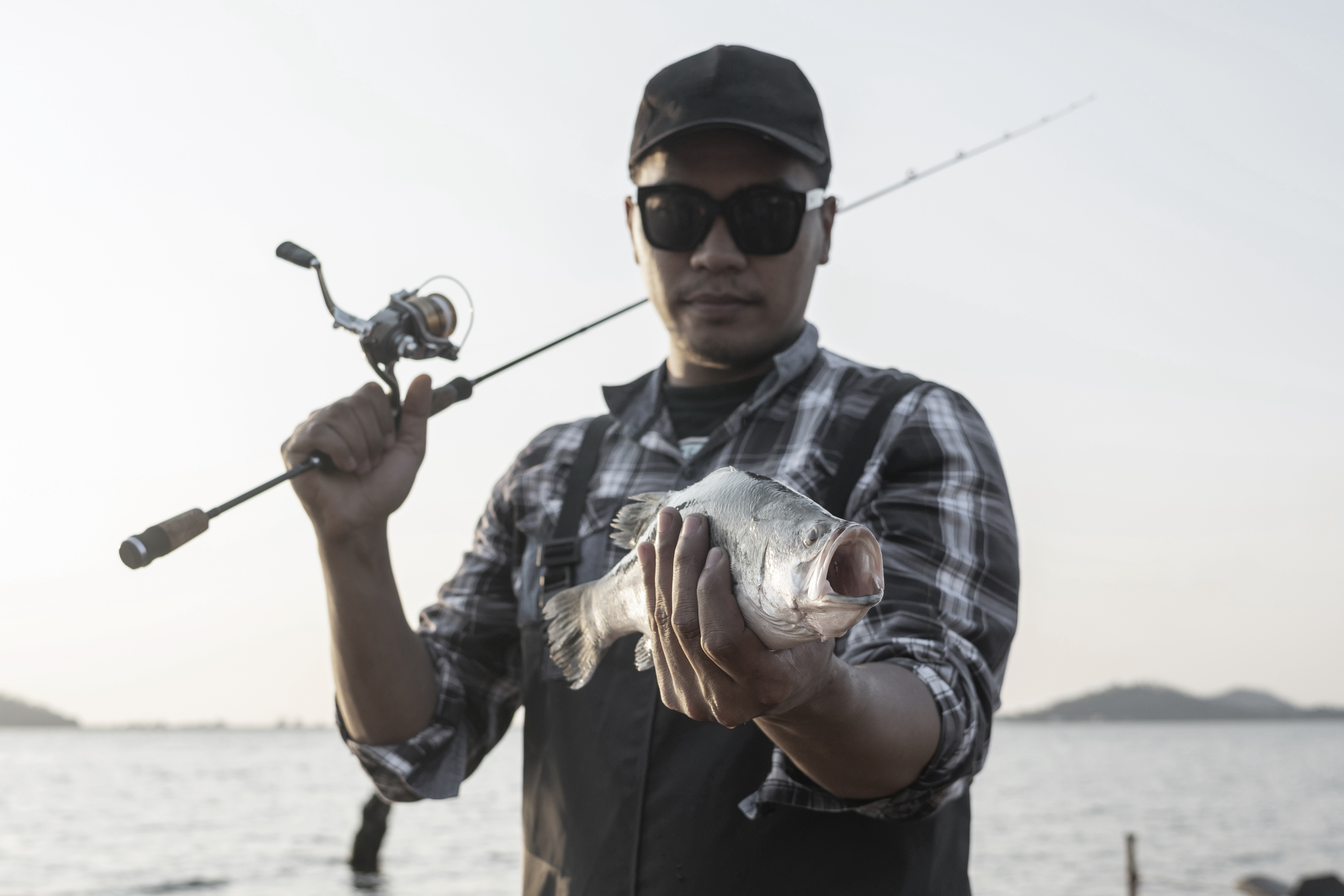 Man Holding Fish