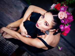 Crown Care Therapy Oil surrounded by straight hair strands and natural botanical ingredients.