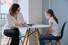 Girl at the female therapist