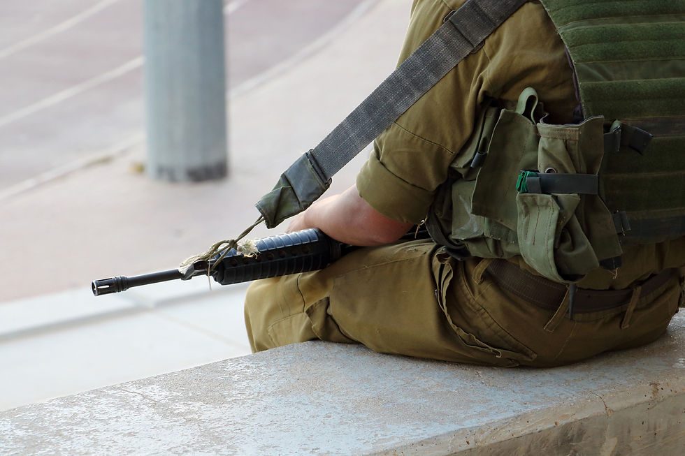 Soldier Sitting Armed