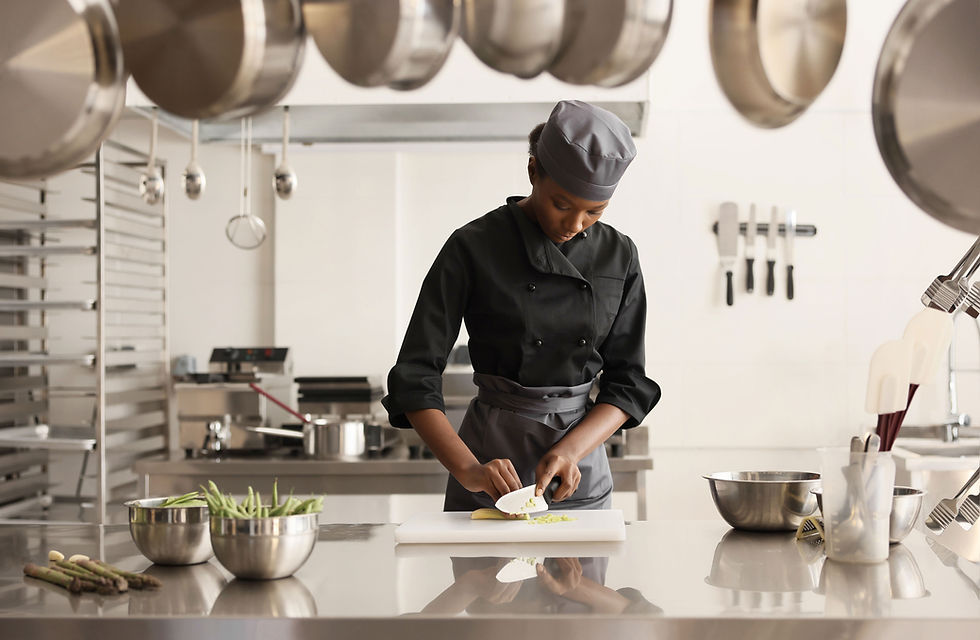 A professional chef preparing healthy food in a kitchen setting