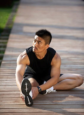 Man Stretching Outdoors