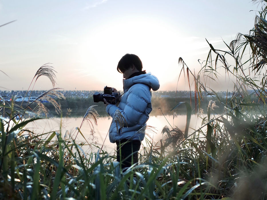 Photographer taking photos during photoshoot