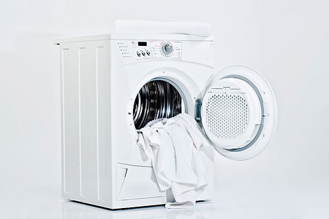 A white washing machine with its door open