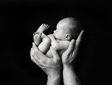 Holding Newborn