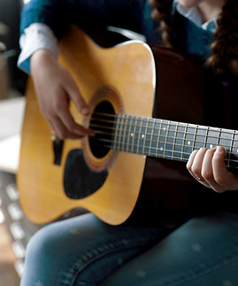 Playing Acoustic Guitar
