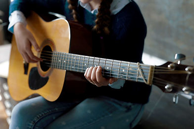 Playing Acoustic Guitar