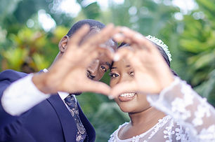 Wedding couple heart gesture