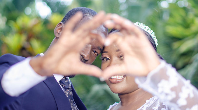 Wedding couple heart gesture