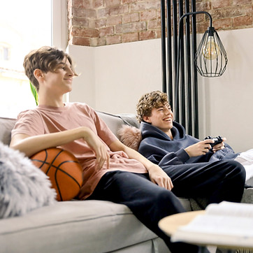 two teens playing video games