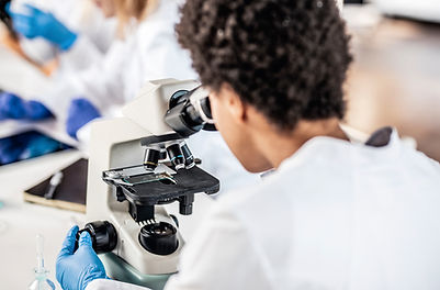 Scientist Using Microscope