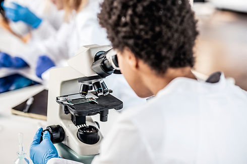 Scientist with Microscope