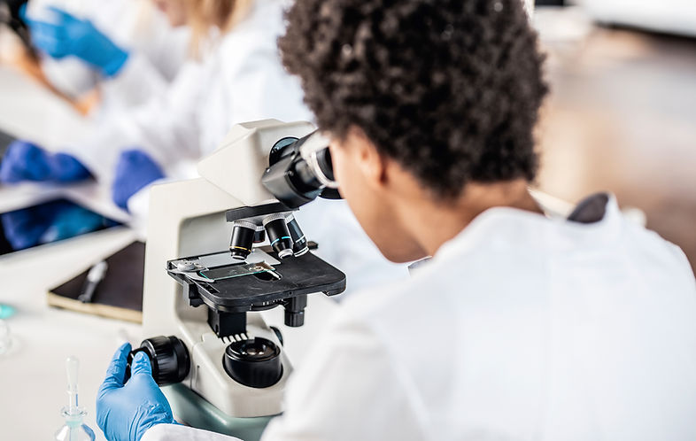 Scientist with Microscope