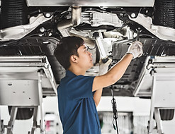 Auto Mechanic Fixing Car