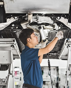 Auto Mechanic Fixing Car