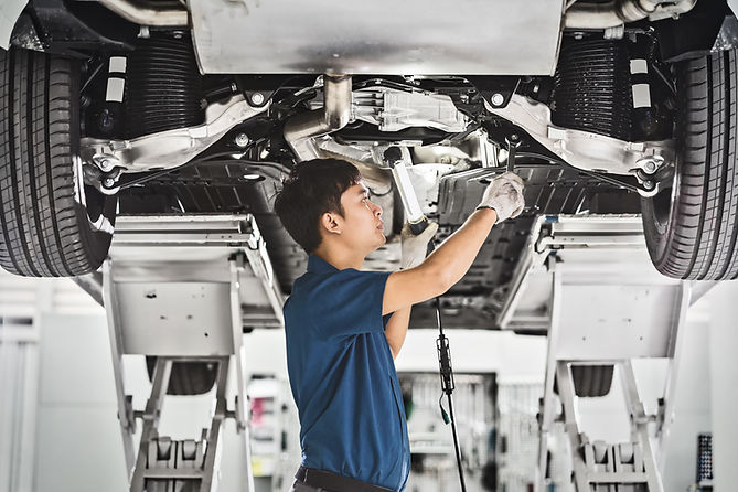 Auto Mechanic Fixing Car