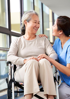 Caregiver Assisting Woman