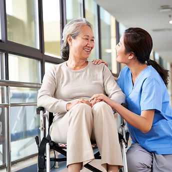 Caregiver Assisting Woman