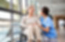 Caregiver Assisting Woman