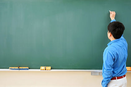 Teacher and Blackboard