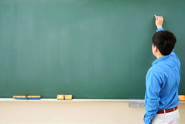 Teacher and Blackboard
