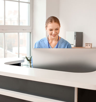 Receptionist at Desk