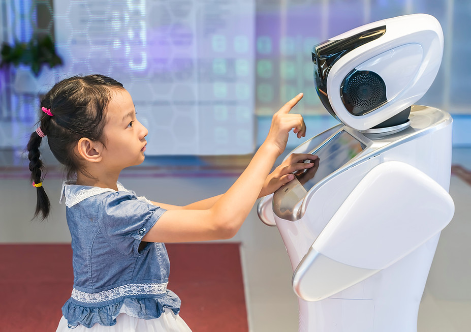 Girl Interacts With Robot