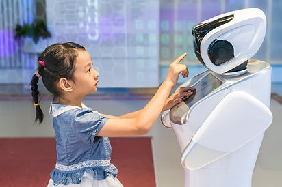 Girl Interacts With Robot
