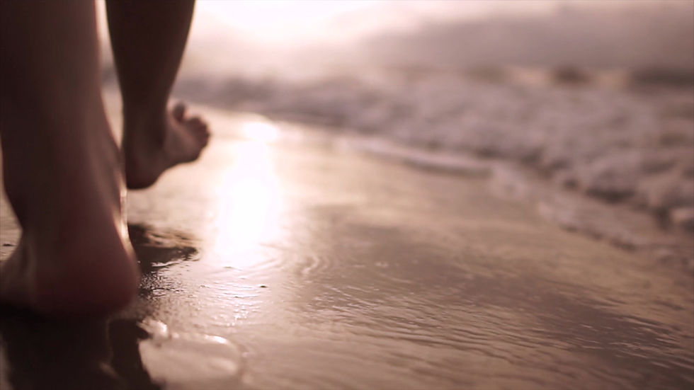 Feet Walking in Waves