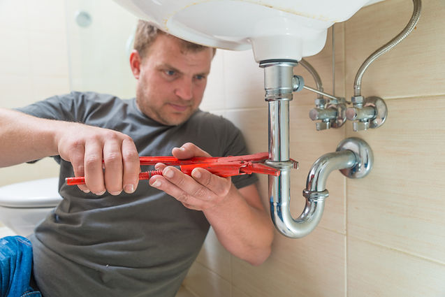 Plumber at work