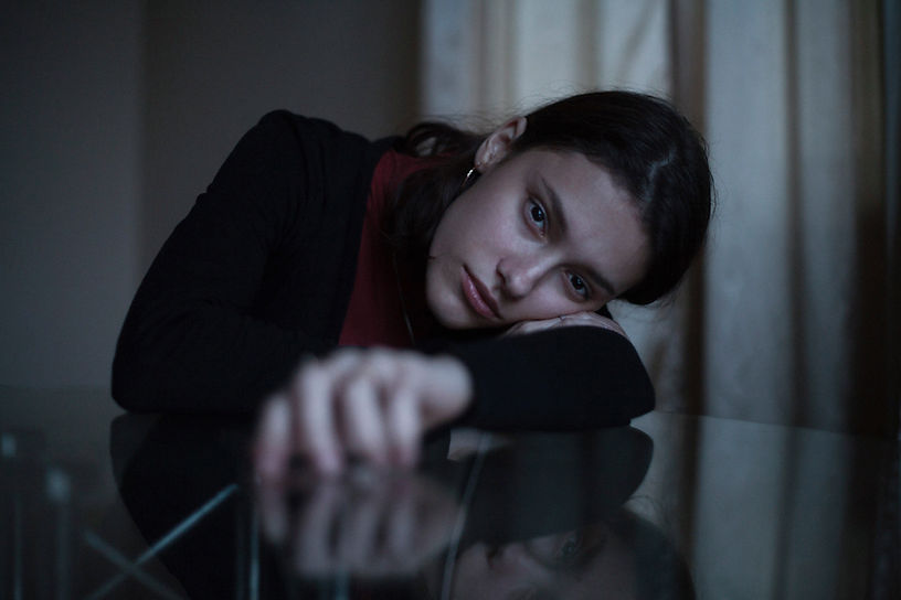 Woman Resting Reflectively