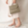 Woman with Handheld Bag