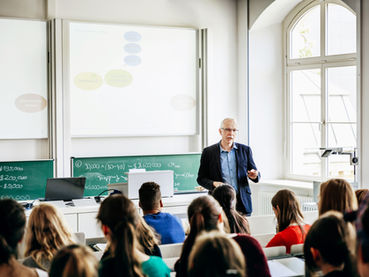 College professor lecturing in a classroom