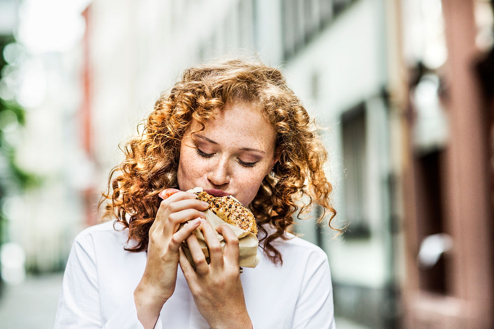 Woman Eating Outdoors