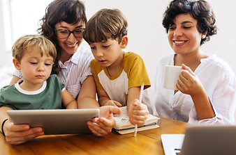 family of 4 on a tablet comuter 