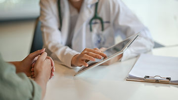 Doctor With Patient
