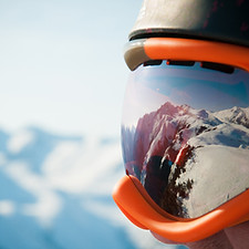 Reflection of mountains in ski goggles