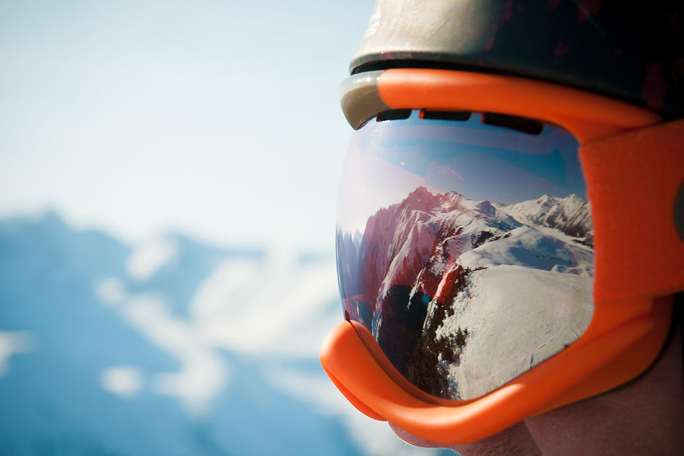 Reflection of mountains in ski goggles